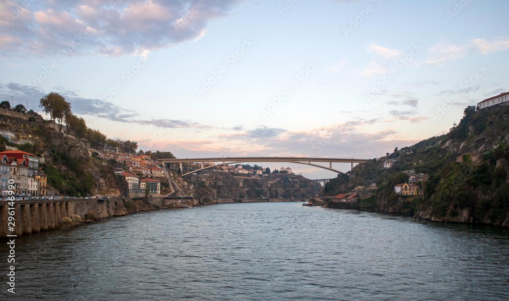 View of Porto downtown on Douro river banks with famous Dom Luis I Bridge, Portugal