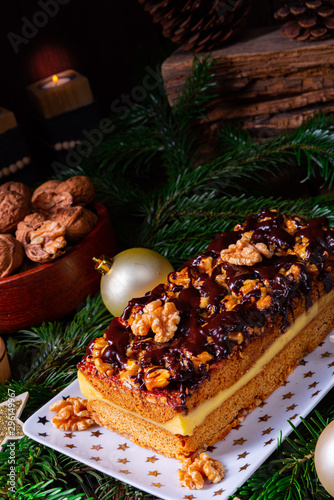 Chocolate gingerbread with filling, jam and nuts