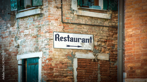 Street Sign to Restaurant