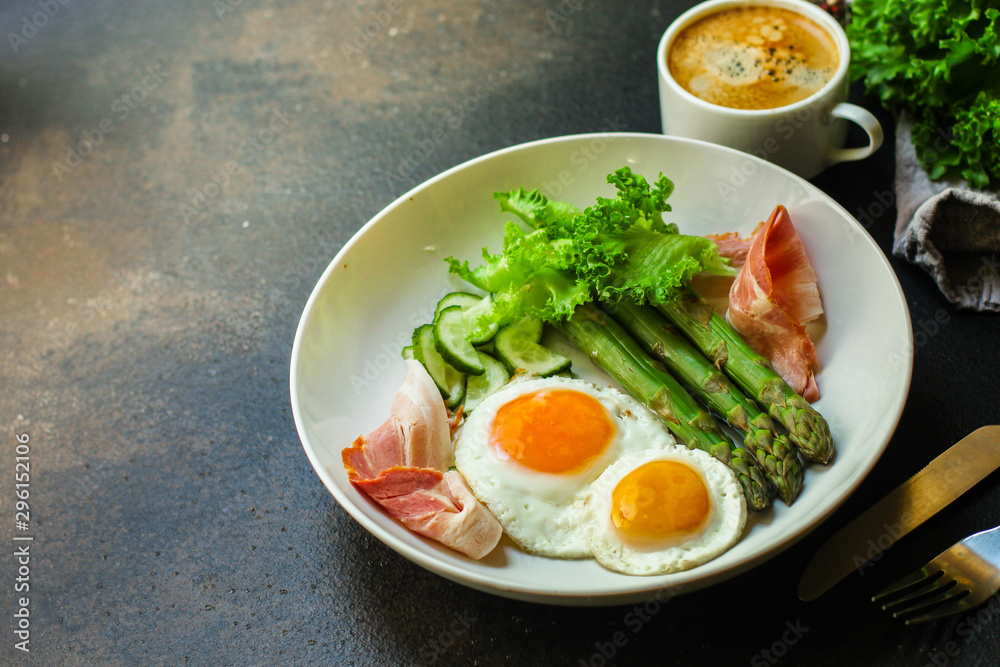 healthy breakfast (fried eggs, bacon, vegetables, asparagus beans, coffee and more) menu concept. food background. copy space. Top view