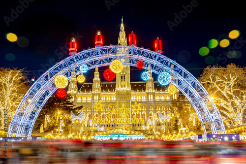 Traditional Christmas market in front of the Rathaus (City Hall) in Vienna, Austria. Translation sign: Merry Christmas