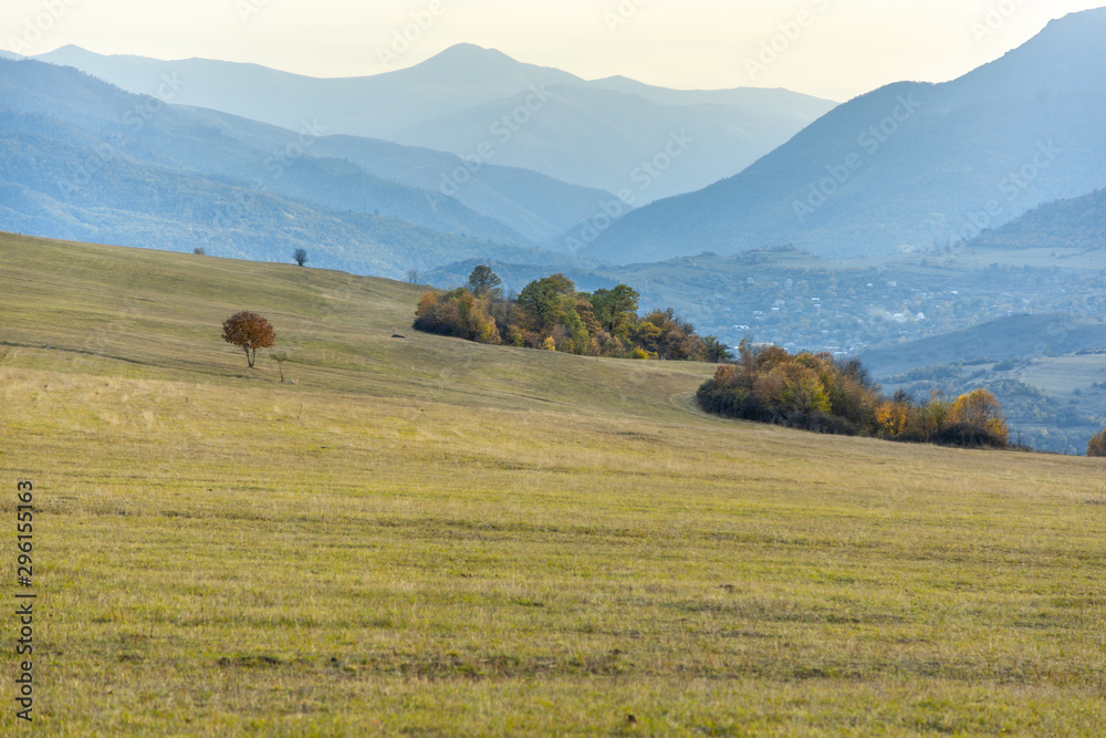 landscape with mountains under blue sky landscape with mountains under blue sky