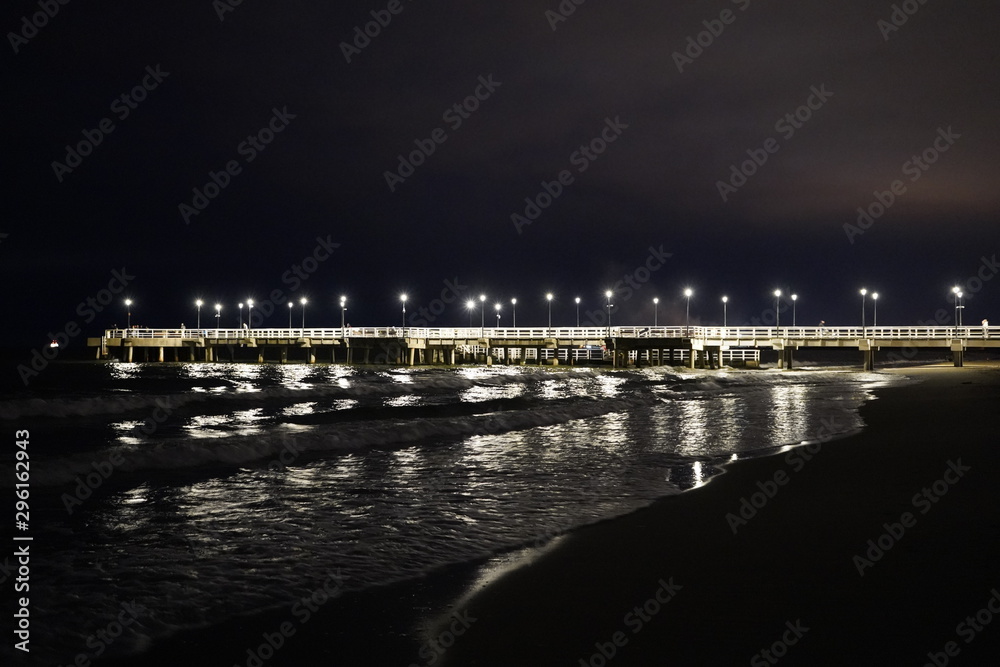 Gdansk, Poland - September 2019: View of the sea pier at night.