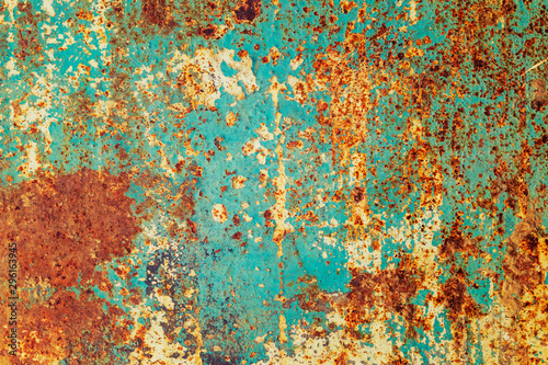 a sheet of metal was coated with paint then painted a different color. time destroyed the coating appeared rust. tectura. photo