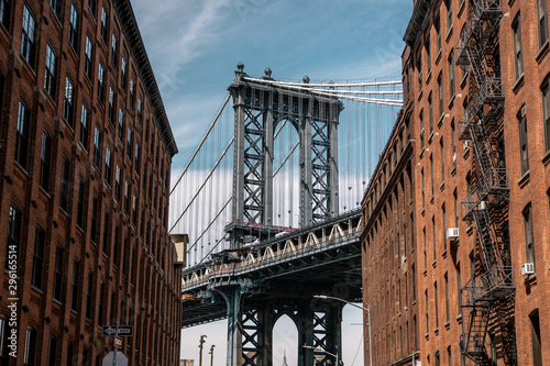 View of one of the towers of the Manhattan Bridge from the streets of the DUMBO district, Brooklyn, NYC 