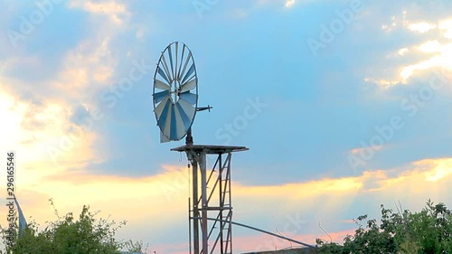 Mini Wind Turbine on blue sky.