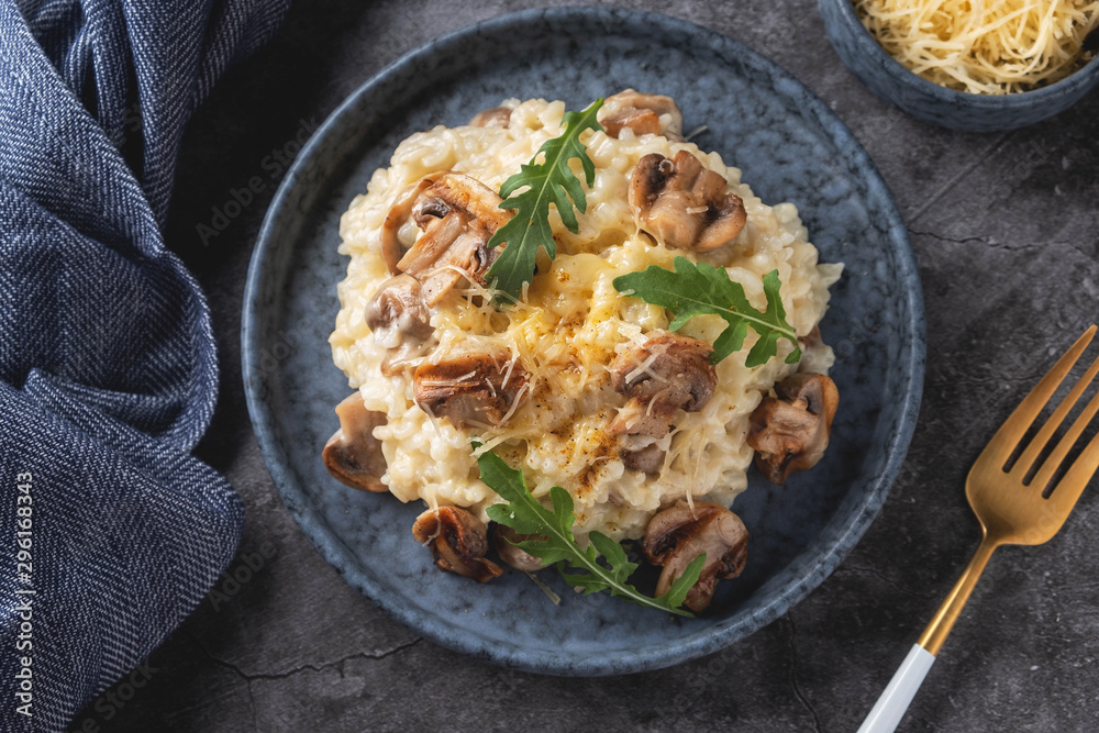 mushroom risotto on a plate, close-up, copy space