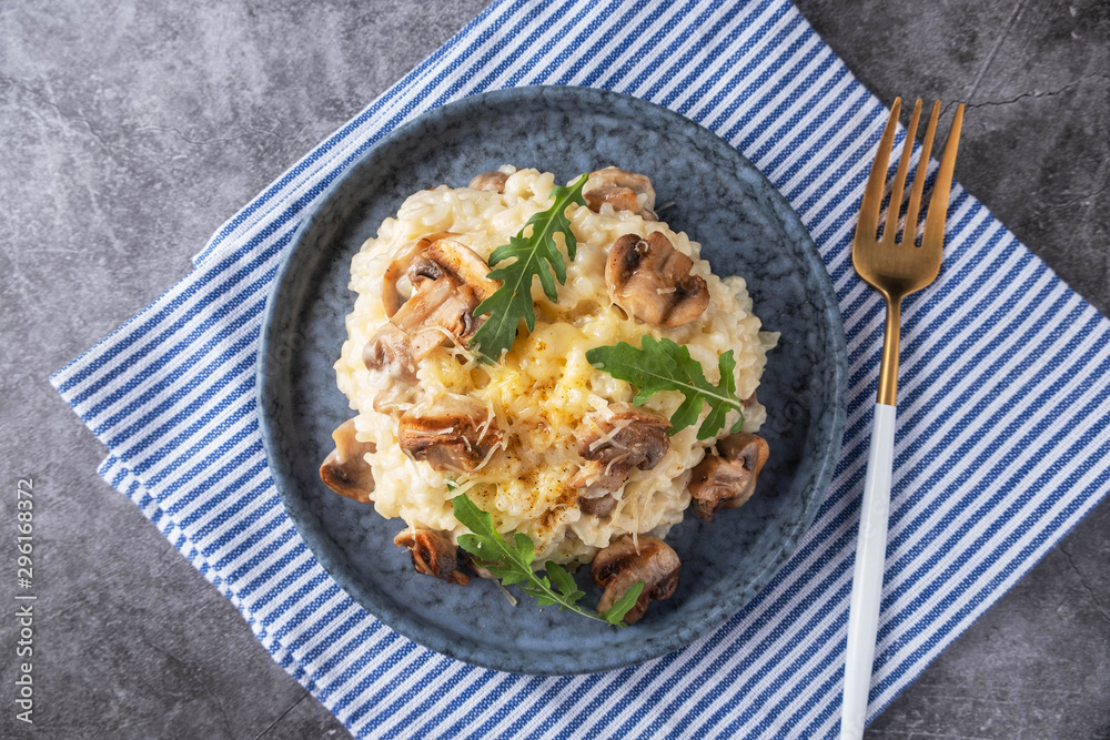 mushroom risotto on a plate, close-up, copy space mushroom risotto on a plate, close-up, copy space