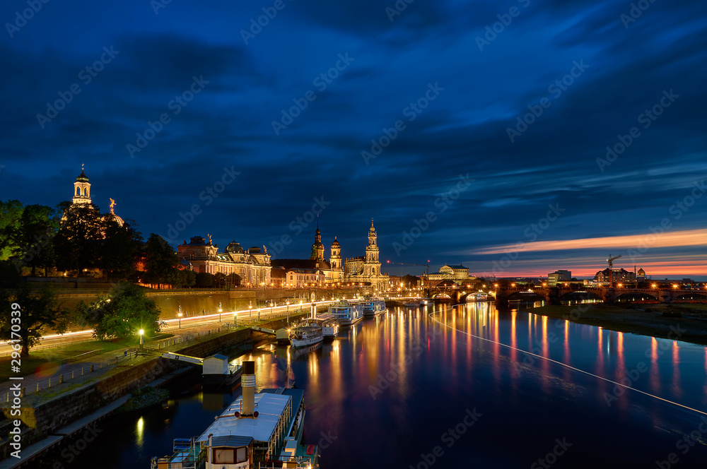 Moody shot of Dresden skyline with the river Elbe and colorful reflections