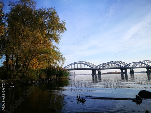 Fototapeta Naklejka Na Ścianę i Meble -   RIVER. BRIDGES. STONES ON THE SHORE. WATER. Dnieper River.