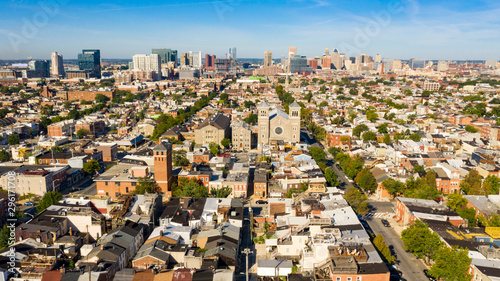 Wide Aerial Perspective over Streets and Neighborhoods of Baltimore Maryland
