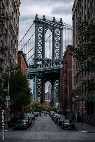View of one of the towers of the Manhattan Bridge from the streets of the DUMBO district, Brooklyn, NYC 