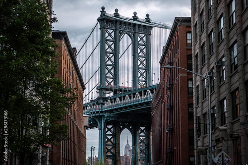 Fototapeta Naklejka Na Ścianę i Meble -  View of one of the towers of the Manhattan Bridge from the streets of the DUMBO district, Brooklyn, NYC 
