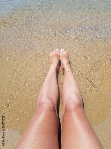 feet on the beach