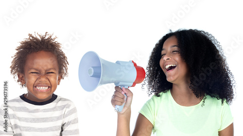 Funny childr shouting through a megaphone to his brother