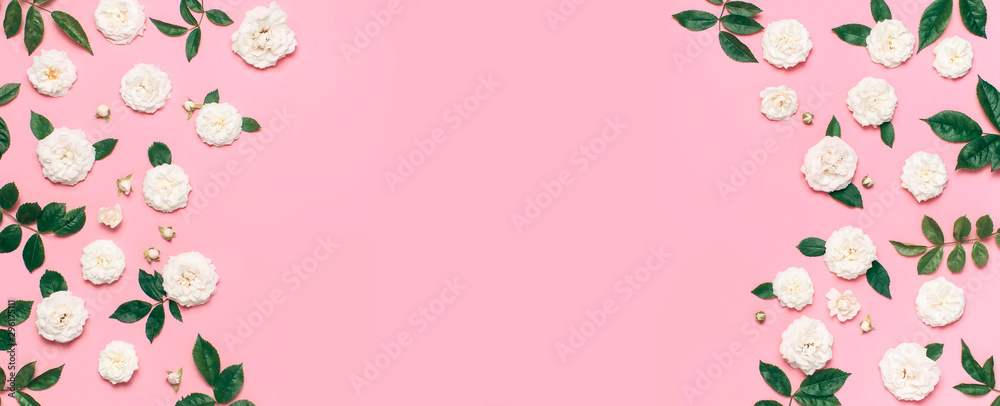 Frame of Flowers composition. White fresh roses and green leaves on gentle pink background. Flat lay, top view, copy space. Flower card, greeting, holiday mockup. Valentine's Day background womens day Frame of Flowers composition. White fresh roses and green leaves on gentle pink background. Flat lay, top view, copy space. Flower card, greeting, holiday mockup. Valentine's Day background womens day