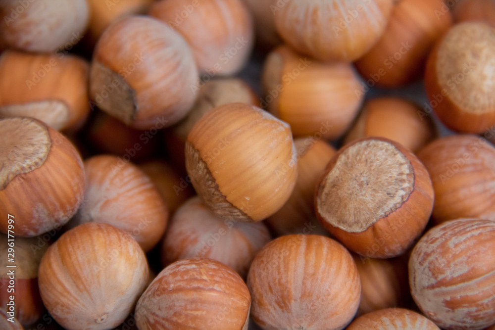 Food background. Hazelnuts texture. Top view . Hazelnut Nut Health Organic Brown Filbert Autumn Background Concept . Hazelnuts. Stack of hazelnuts. Food background. Hazelnuts texture. Top view . Hazelnut Nut Health Organic Brown Filbert Autumn Background Concept . Hazelnuts. Stack of hazelnuts.