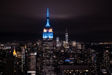 Wandcirkels Empire State Building New York skyline bij nacht verlicht  © FitchGallery