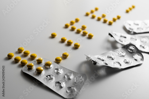  word is made of pills. life. around is used packaging from vitamin. on white background