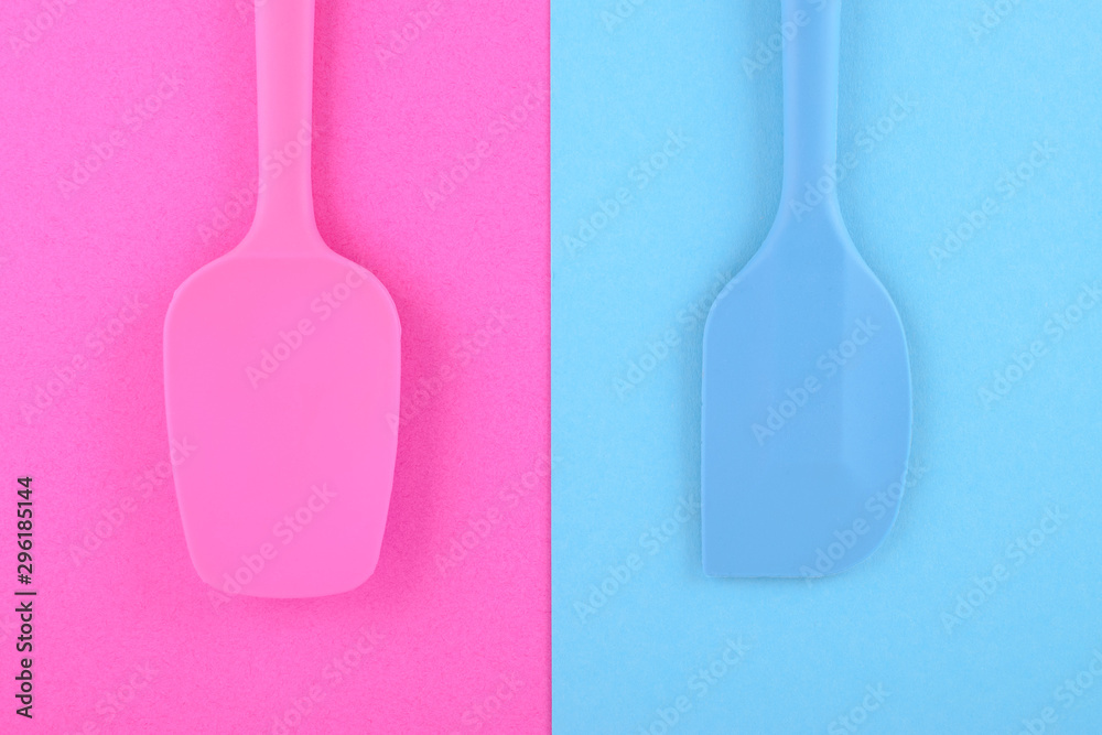 bright kitchen utensils on pink and blue background, flat lay bright kitchen utensils on pink and blue background, flat lay
