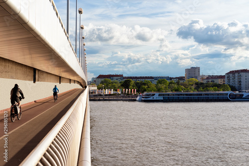 Canvas Print Bicycles on bridge at Danube River in Donaustadt in Vienna