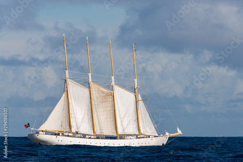Tall ship with sails at sea