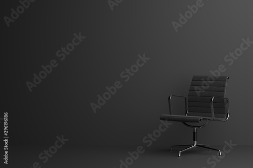 Office chair in dark room. Minimal style concept.
