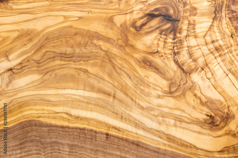 Fototapeta premium Beautiful olive wood texture background, top view