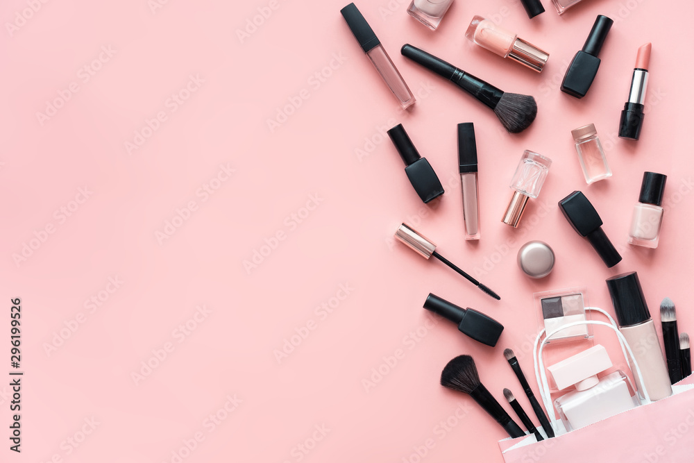 Online make up cosmetic beauty shop women products accessories pouring from  shopping bag on pink flat lay background, cheap discount retail fashion  offer, top view above copy space Stock Photo | Adobe
