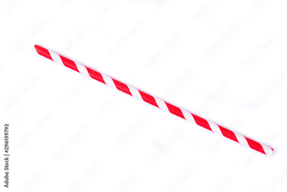 Closeup of drinking straw for party. White,red spiral. Top view of colorful disposable eco-friendly straw for summer cocktails. Paper coctail colorful straw isolated on white background, isolated. Closeup of drinking straw for party. White,red spiral. Top view of colorful disposable eco-friendly straw for summer cocktails. Paper coctail colorful straw isolated on white background, isolated.