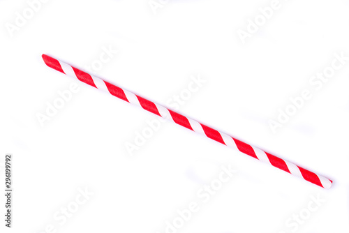 Closeup of drinking straw for party.  White,red spiral. Top view of colorful disposable eco-friendly straw for summer cocktails. Paper coctail colorful straw isolated on white  background, isolated.
