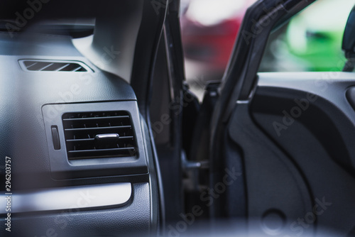 selective focus of car interior with open front door © LIGHTFIELD STUDIOS