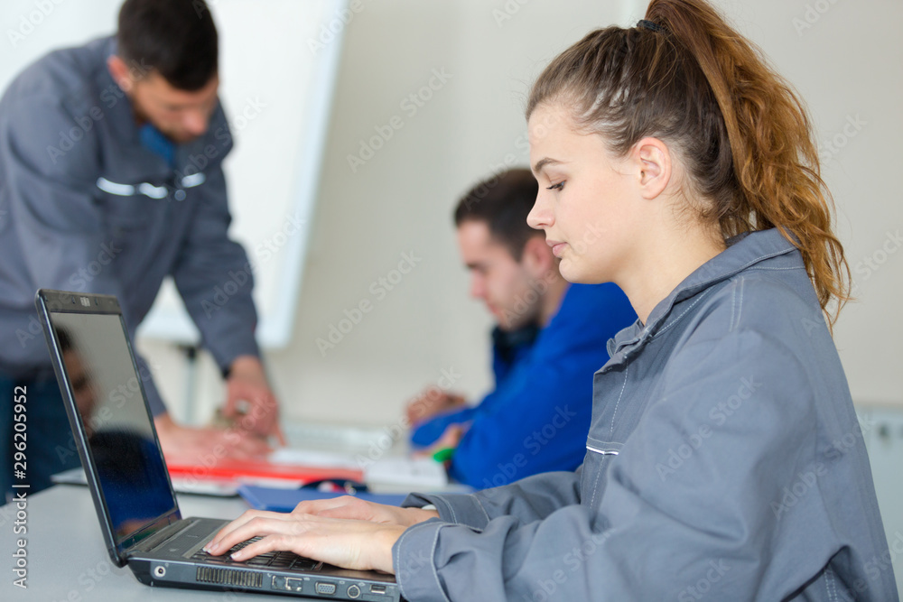 young woman engineer working on robotics project young woman engineer working on robotics project
