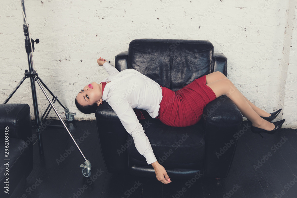 Crime Scene With Strangled Pretty Business Woman In Office Stock Photo