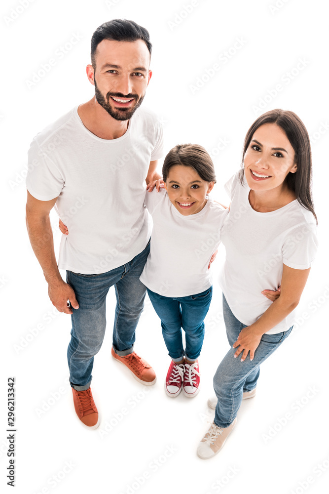 Fototapeta premium overhead view of happy parents and kid looking at camera isolated on white