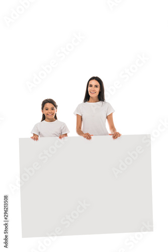 happy mother and daughter standing with placard isolated on white