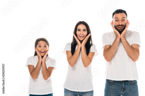 excited parents and kid looking at camera isolated on white