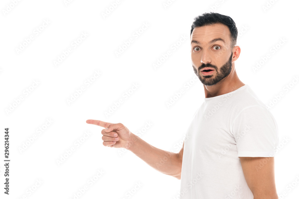 surprised man pointing with finger and looking at camera isolated on white surprised man pointing with finger and looking at camera isolated on white