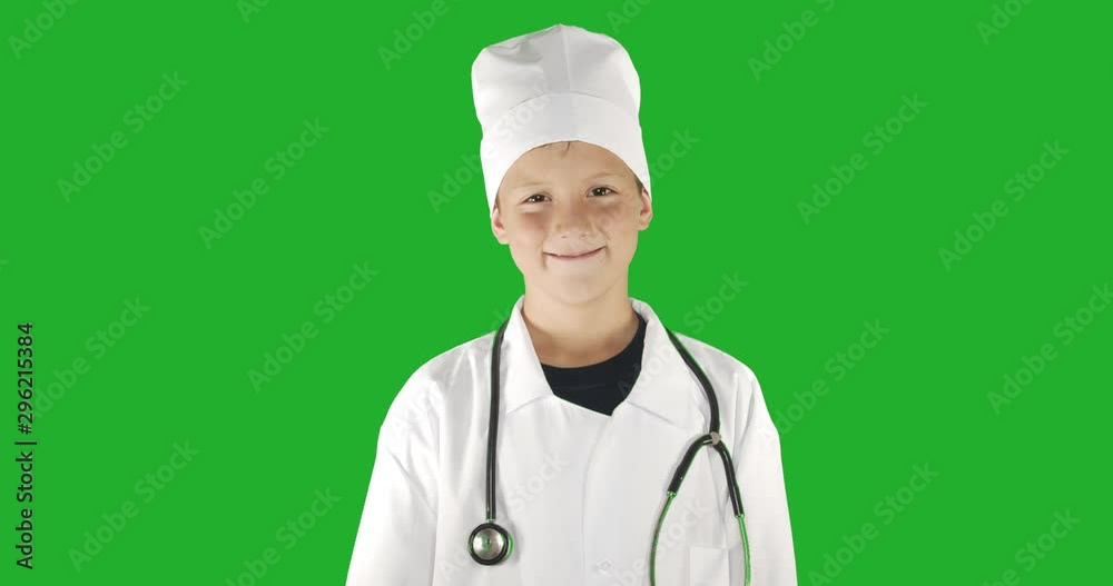 Portrait of doctor boy, smiling . Green screen hromakey background for keying. Portrait of doctor boy, smiling . Green screen hromakey background for keying.