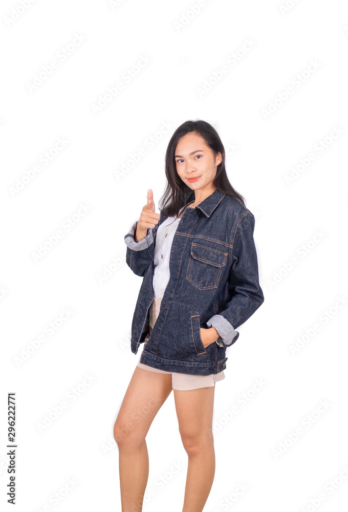 An Asian girl in jeans jacket and shorts posing front of the camera An Asian girl in jeans jacket and shorts posing front of the camera