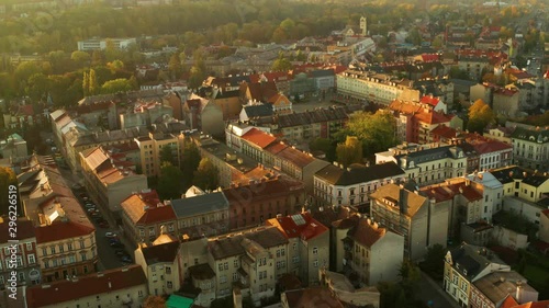 Aerial Shot Of historic city in autumn colors at sunrise