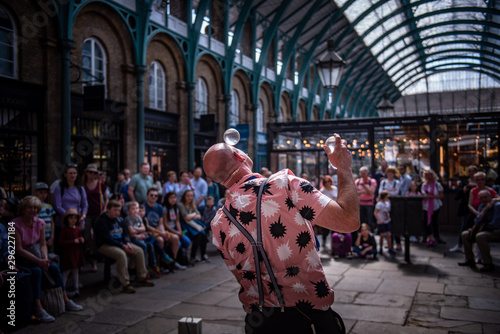 magician doing a show in covent garden photo