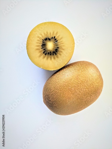 Juicy hald cut golden kiwifruit healthy and ready to eat photo