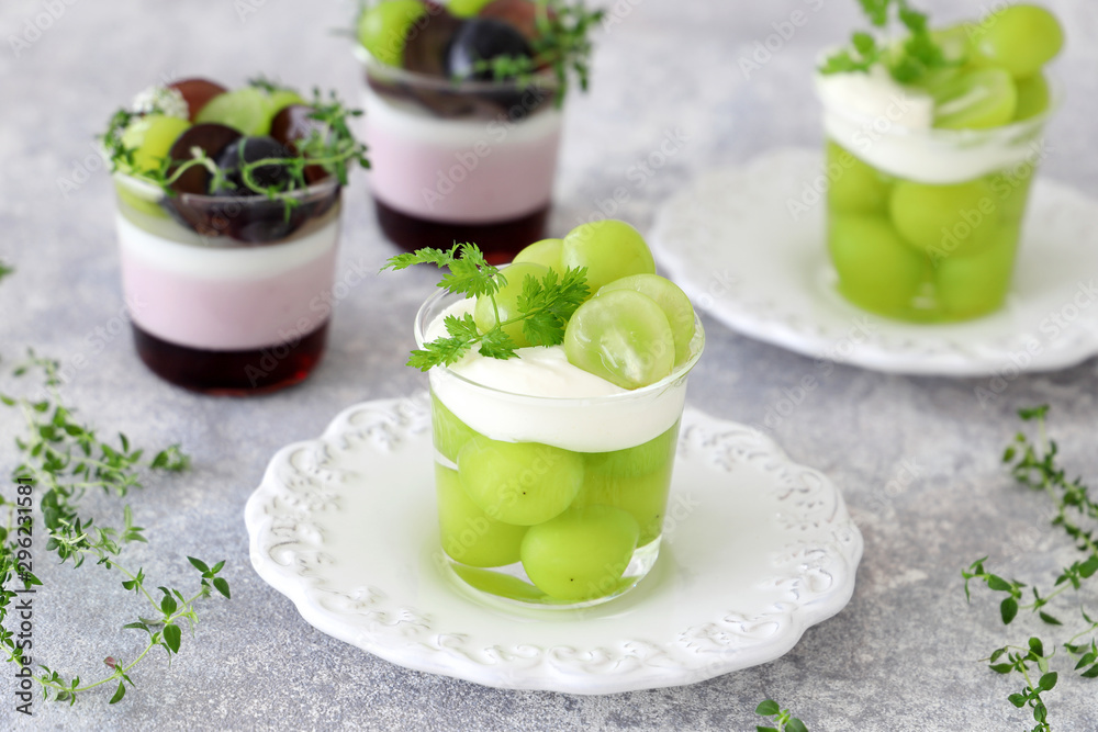 Homemade glass dessert with green grapes Homemade glass dessert with green grapes