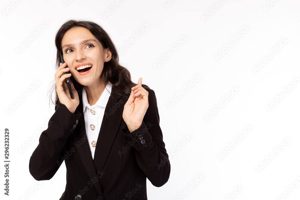 Business woman talking with customer on mobile phone. Attractive beautiful young businesswoman gets happiness, satisfied that client order, buy a lots of goods, smile face. It is good news. copy space Business woman talking with customer on mobile phone. Attractive beautiful young businesswoman gets happiness, satisfied that client order, buy a lots of goods, smile face. It is good news. copy space