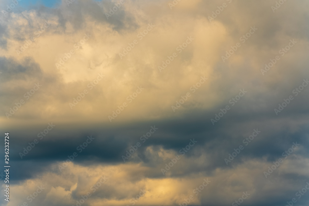 Summer clouds floating across sunny sky to change weather. Natural meteorology abstract texture, nature background. Atmospheric and optical dispersion, soft focus, motion blur clouds.