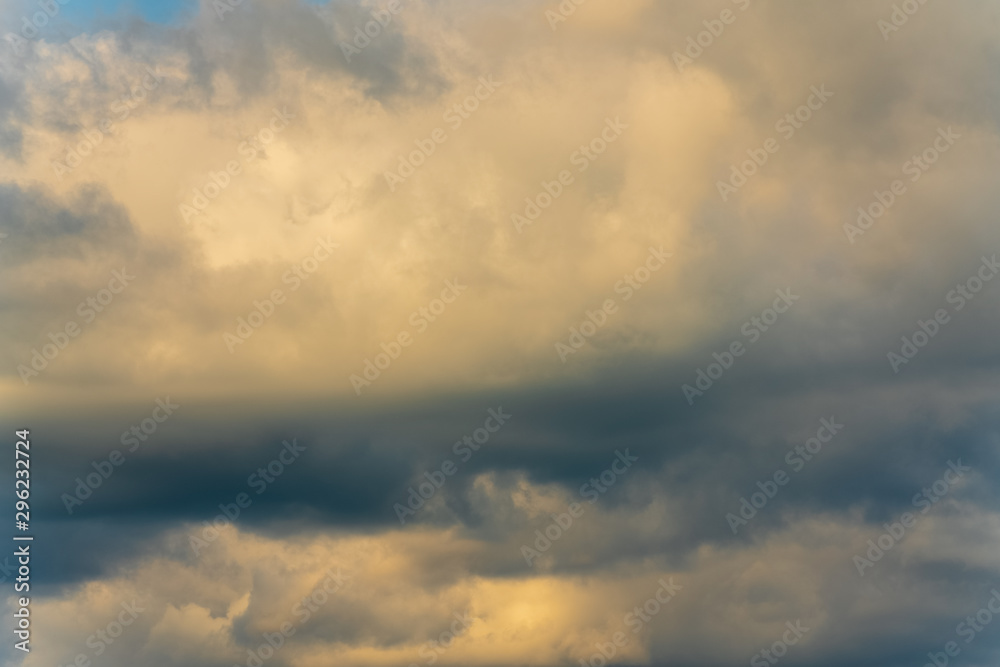 Summer clouds floating across sunny sky to change weather. Natural meteorology abstract texture, nature background. Atmospheric and optical dispersion, soft focus, motion blur clouds. Summer clouds floating across sunny sky to change weather. Natural meteorology abstract texture, nature background. Atmospheric and optical dispersion, soft focus, motion blur clouds.