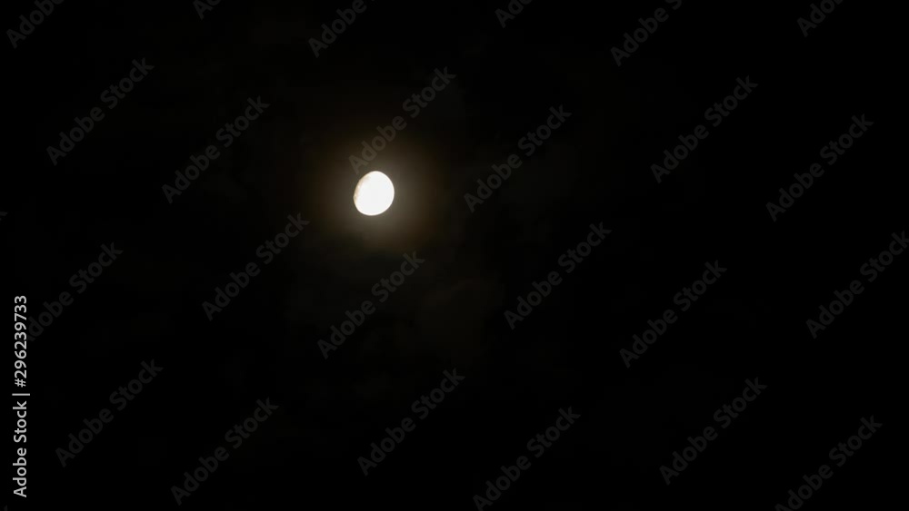 Beautiful, relaxing time-lapse of the moon above flowing clouds. Beautiful, relaxing time-lapse of the moon above flowing clouds.