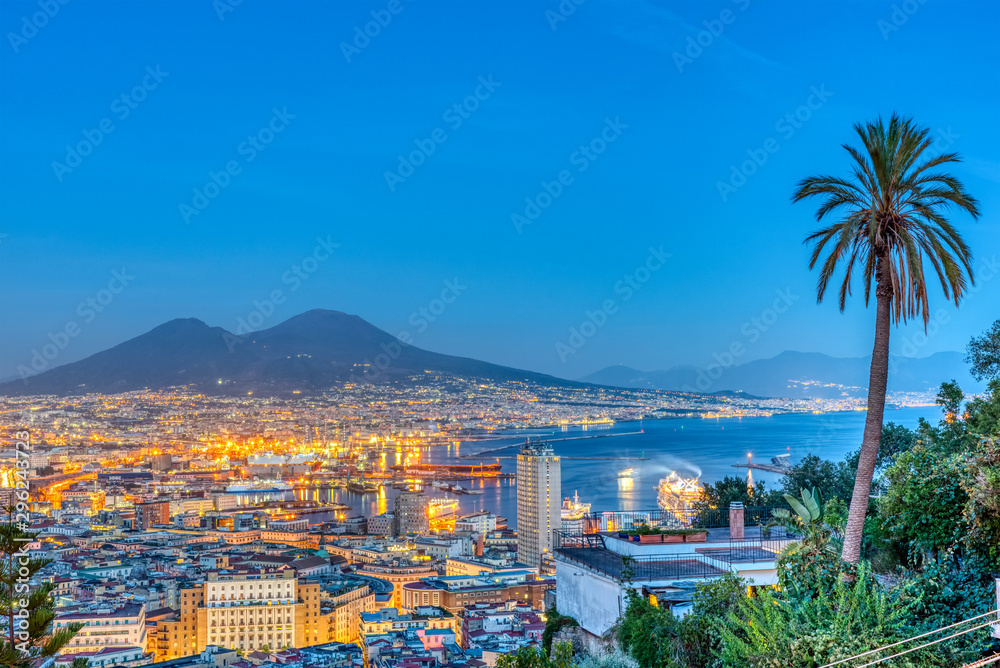 Naples in Italy with Mount Vesuvius at dusk