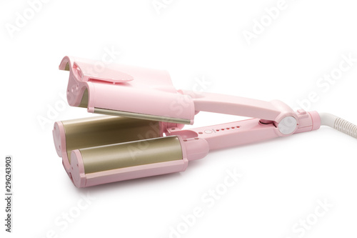 Electric curling iron or hair straightener for styling isolated on white background with clipping path.